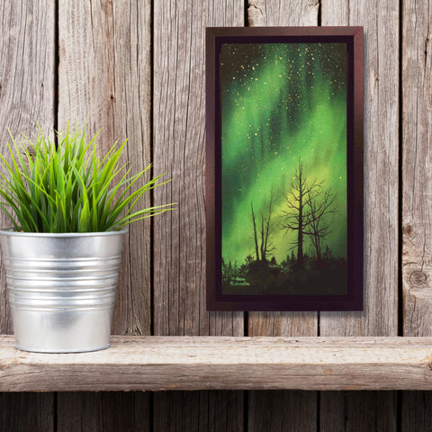 Reach for the Stars, watercolour by Karen Richardson, shown on a rustic wall