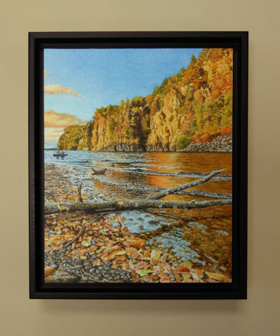 Framed landscape painting of a lake, cliffs, and trees with autumn colours, titled Mazinaw Majesty by Karen Richardson