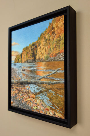 Framed landscape painting of a lake, cliffs, and trees with autumn colours, titled Mazinaw Majesty by Karen Richardson