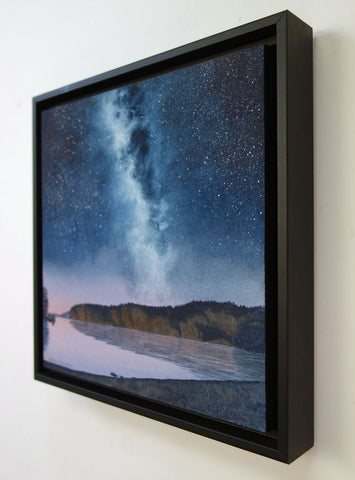 Painting of a starry night sky over a lake with cliffs and trees, titled Mazinaw Midnight, by Karen Richardson.