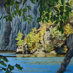 Scenic landscape with trees, rocks, and a blue lake. Titled Mazinaw Moment by Karen Richardson
