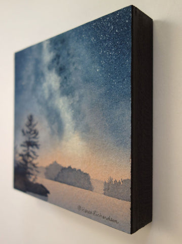 Painting of a starry night sky over a lake with silhouetted trees, titled Stardust, by Karen Richardson