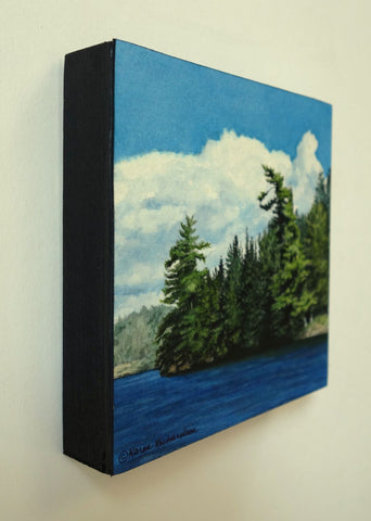 Summer Magic, watercolour of a treed shoreline on a blue lake, by Karen Richardson