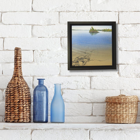 Serenity by the Shore, watercolour by Karen Richardson, shown above a shelf