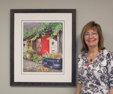Karen Richardson with a framed Elora Doors paper giclee